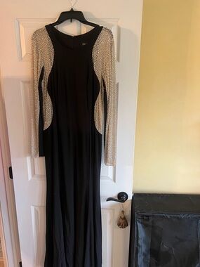 Elegant Black Evening Gown with Embellished Ivory Sleeves